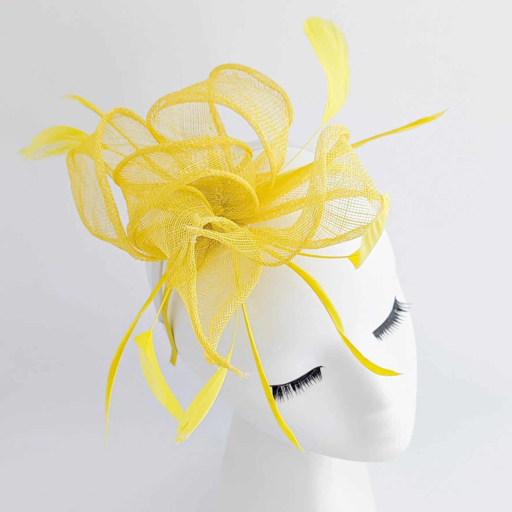 Yellow feather fascinator hat - House of Hats