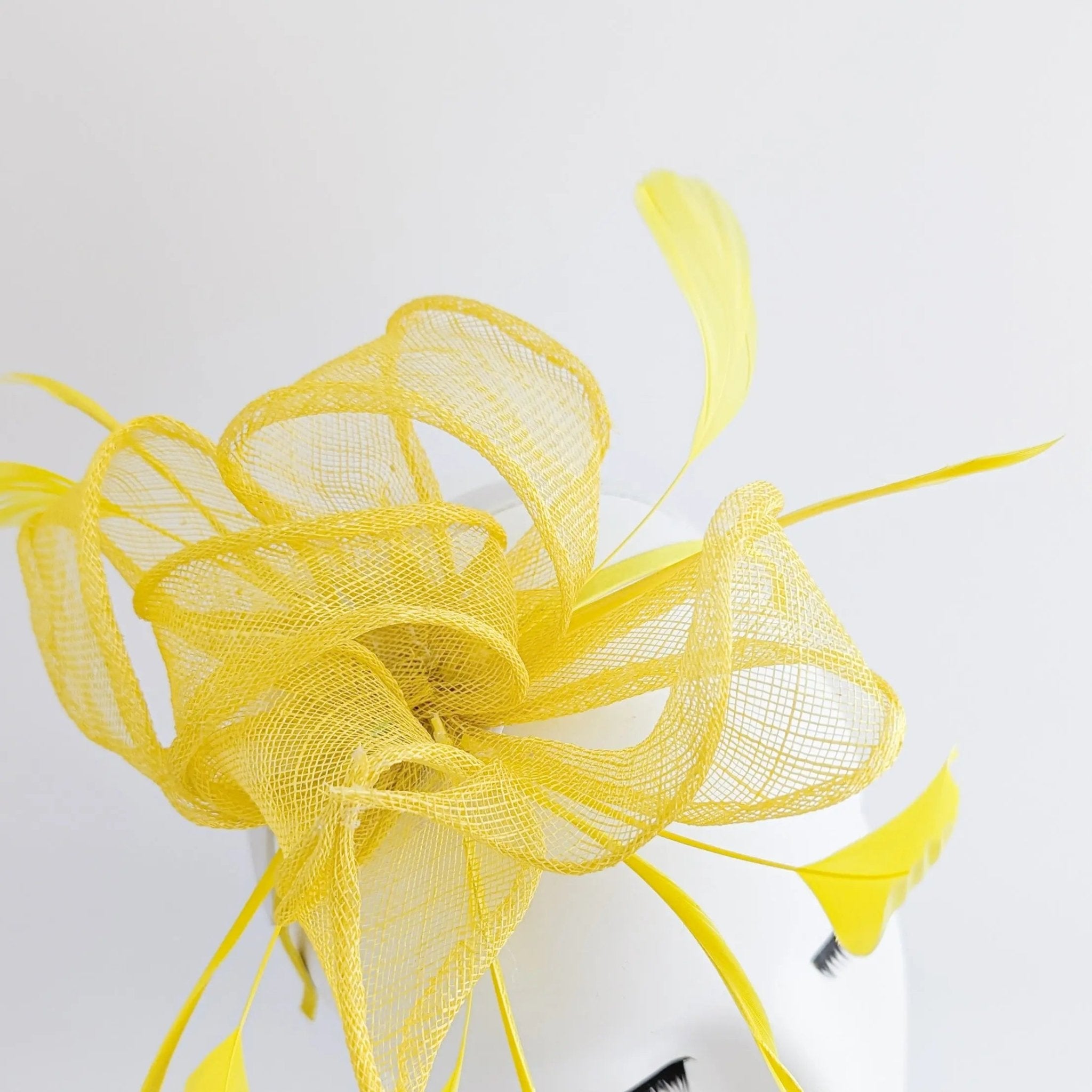 Yellow feather fascinator hat - House of Hats