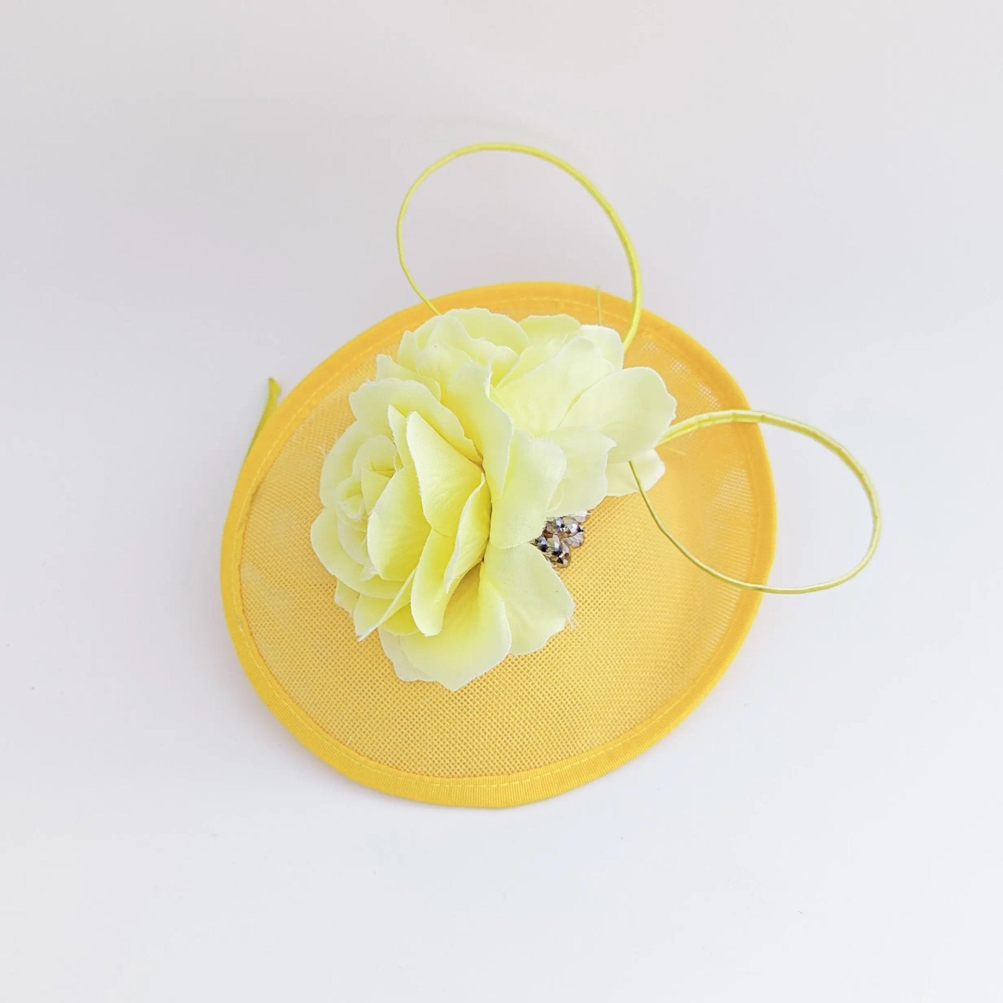 Yellow flower disc saucer fascinator hat - House of Hats