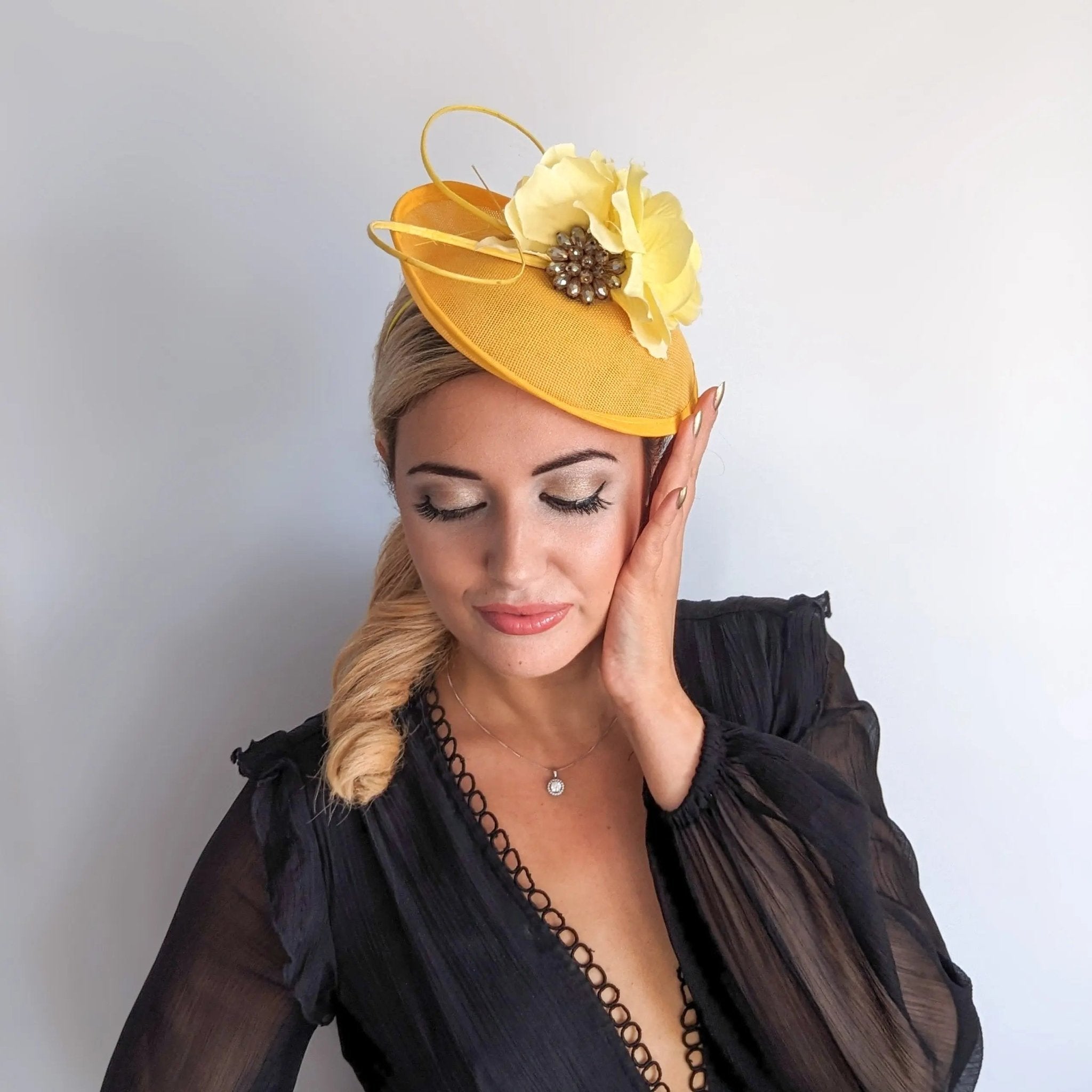 Yellow flower disc saucer fascinator hat - House of Hats